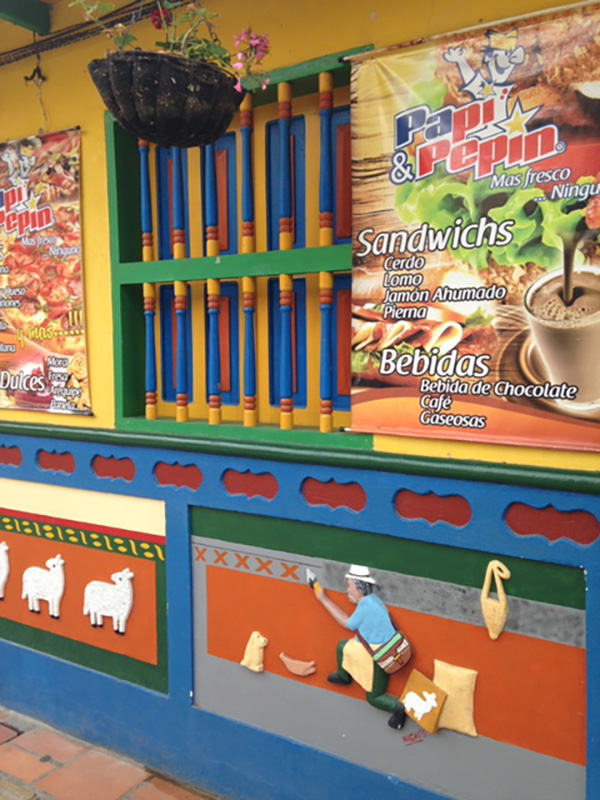 Colorfully painted and crafted exterior of a sandwich shop